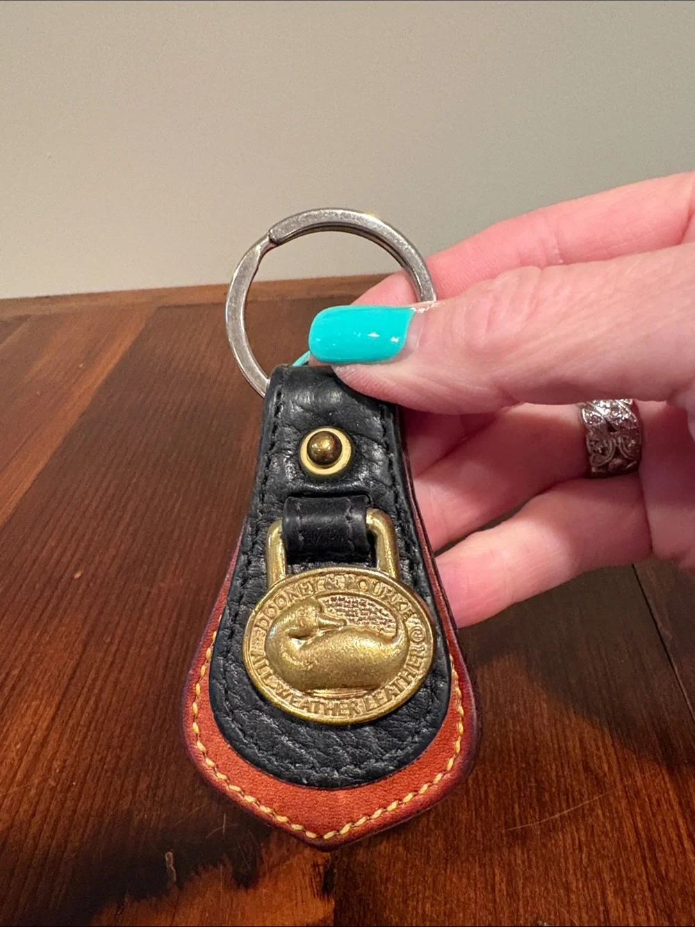 Dooney & Bourke Vintage Brass Duck Leather Keychain